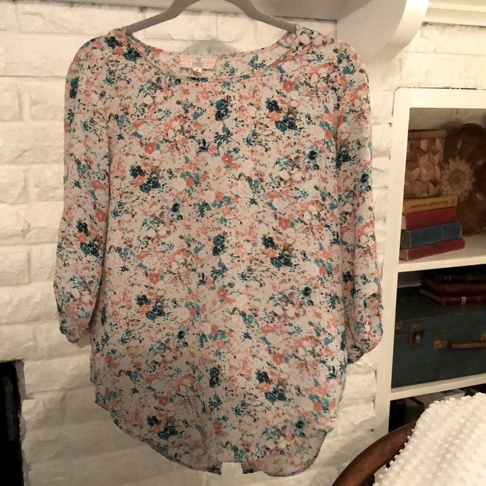 Cream, green-turquoise and peach blouse.
